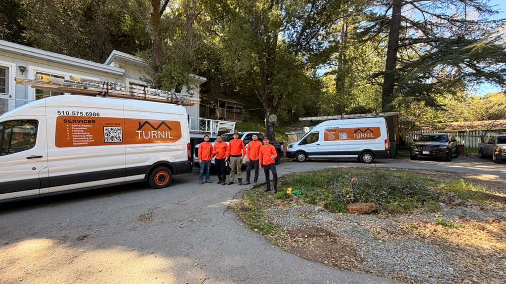 Turnil Construction vans and crew on site