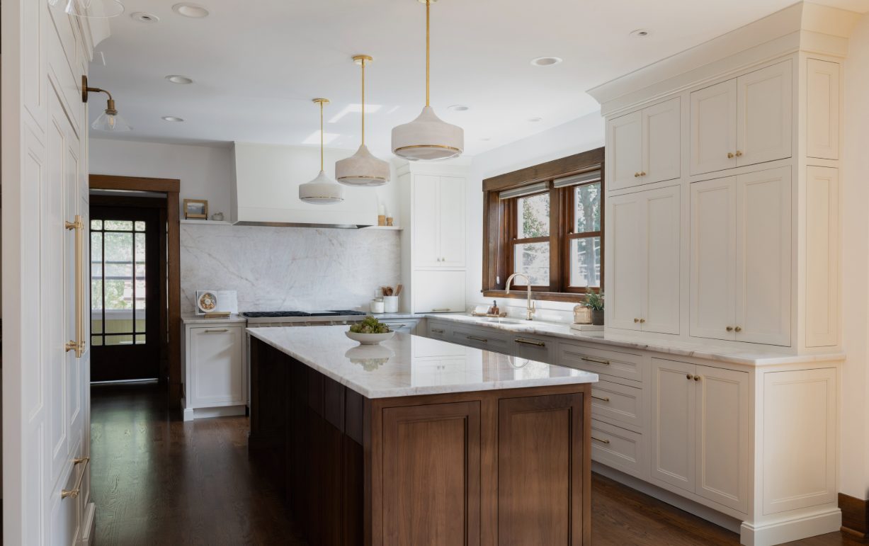 Custom kitchen with waterfall marble island